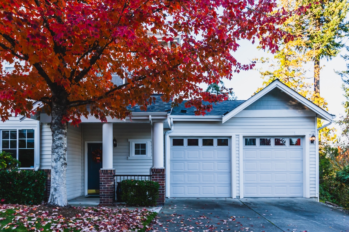 Residential home real estate sales investment concept in fall autumn season.